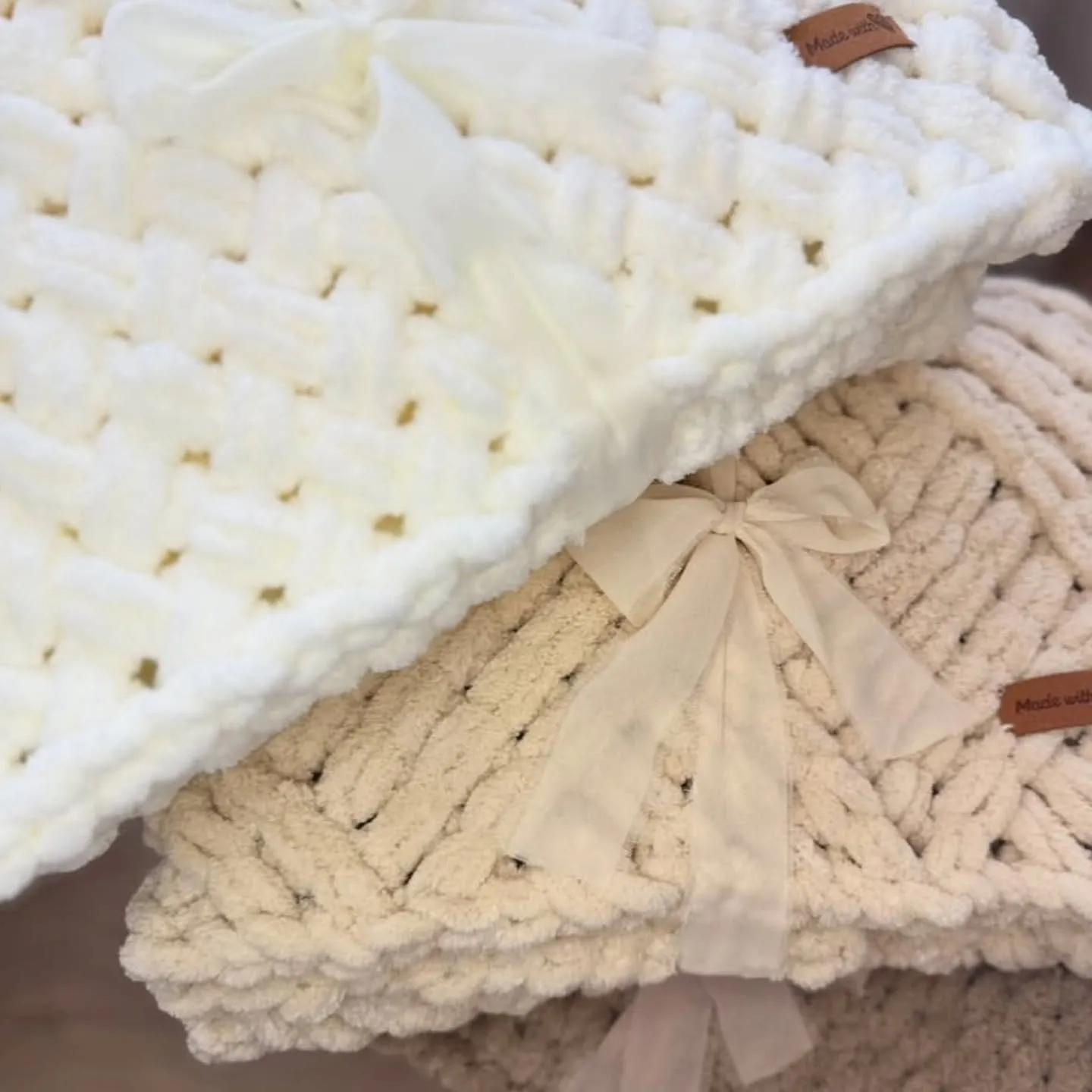 Folded chunky blankets, close up